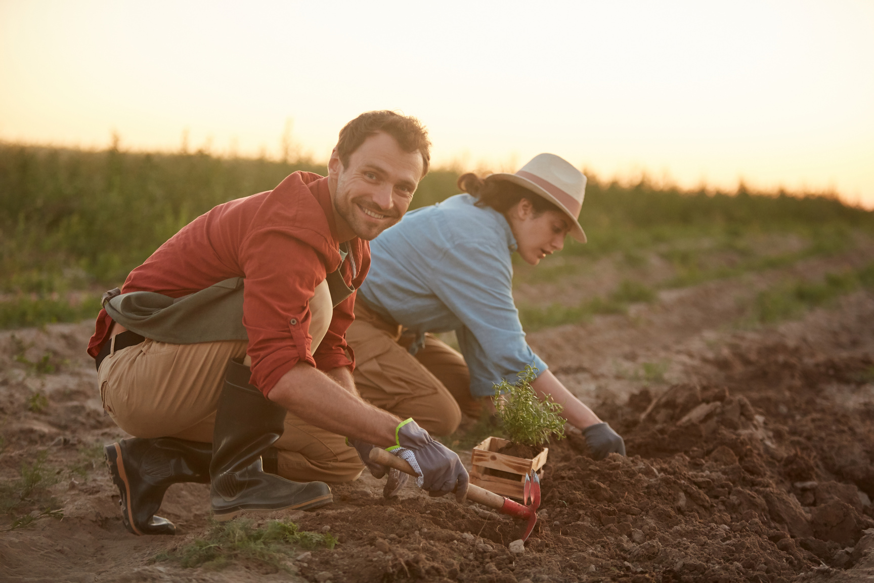 Smiling Young Man Working in the Field